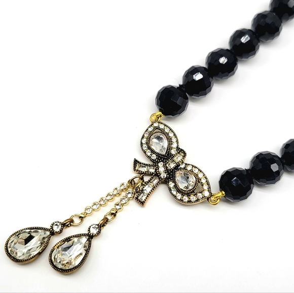 Vestto elegante da bambna a collo quadrato con manche a gocca, decorato con perlne